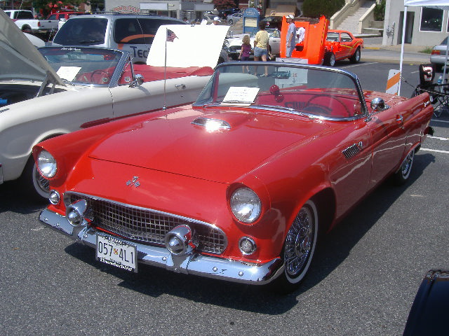 I think this is a 1955 Ford Thunderbird - hell, that was before my time. Sweet looking ride though.